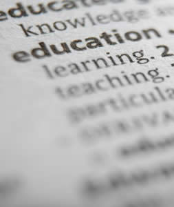 Closeup of the word education on a dictionary